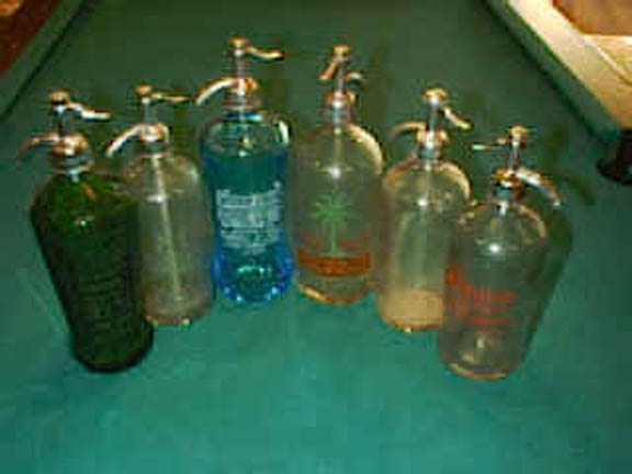 collection of seltzer bottles