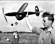  Roy Chesterton, winner of the   Wakefield Rubber powered model airplane contest in 1948 holding jaguar his winning model