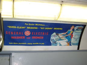 GE Ironer Subway Card Advertisement
