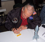 Buzz Aldrin Signing a bank